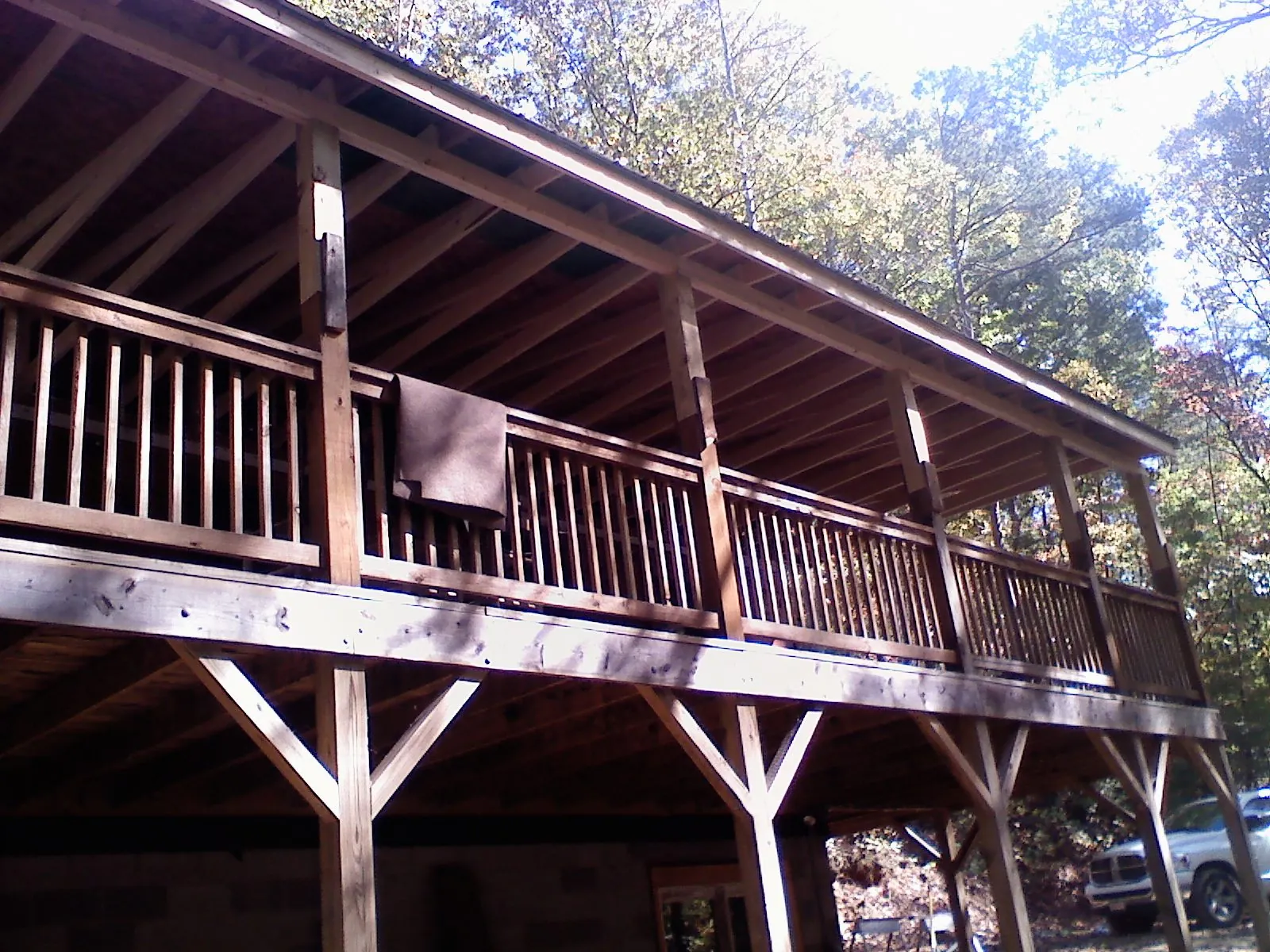 Timber framing under a new elevated porch and deck — Roof Leak Repair in Mico by Roofing Brothers